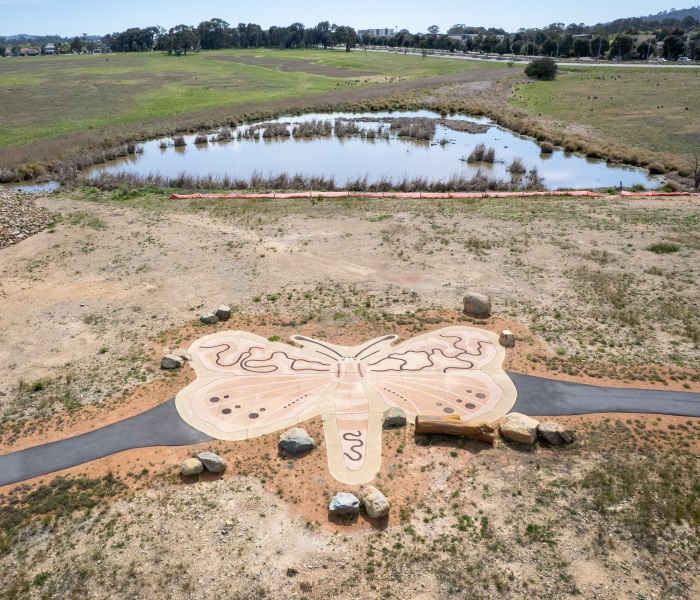 Image of the Budjan Galindji Nature Reserve showing a track in the shape of a moth with the wetlands in the background.
