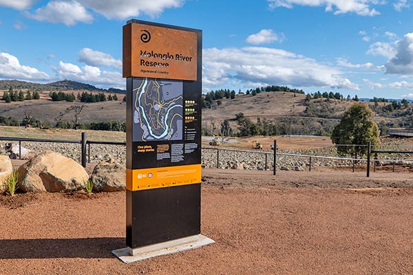 Newly installed Namarag signage during constructions with machinery in background